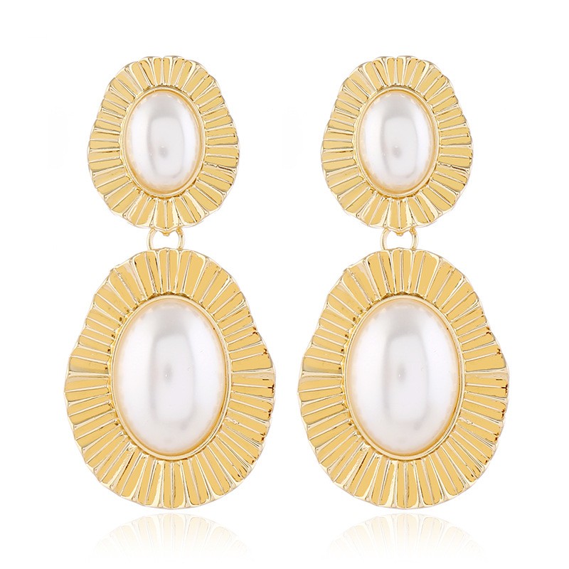 Turn heads with these gold pearl Earrings for women