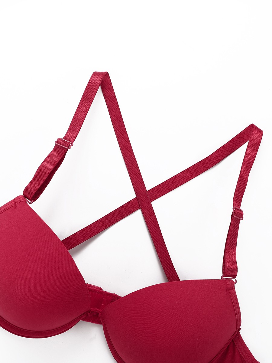 Women's bra cross strap for added comfort and support